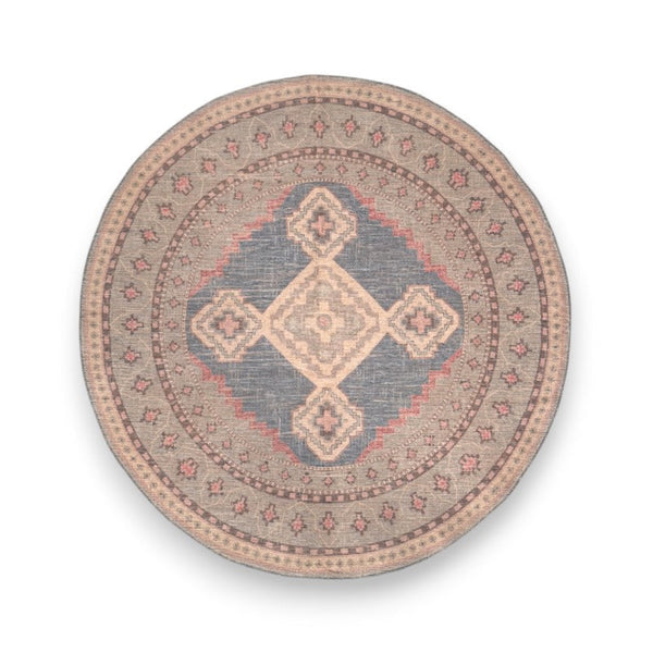 Round rug with geometric pattern on a white background